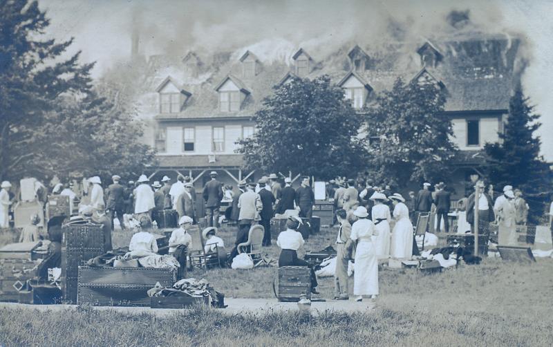 The hotel and Rosewood cottage aflame in mid-August 1913. Visitors with their steamer trunks watch the fire, while others came by boat or simply stood and watched from the mainland. Seven-year-old Lester Barter told me he watched from McKown Hill in the Harbor. All photos courtesy of the Boothbay Region Historical Society
